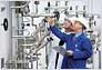 Linde service men are checking technical details of an installation