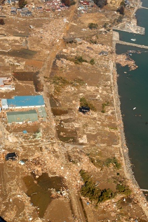 Aerial view of Sendai, Japan, following Fridays earthquake. (© U.S. Navy)