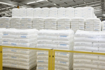 After production, the product is either loaded directly into a container or...