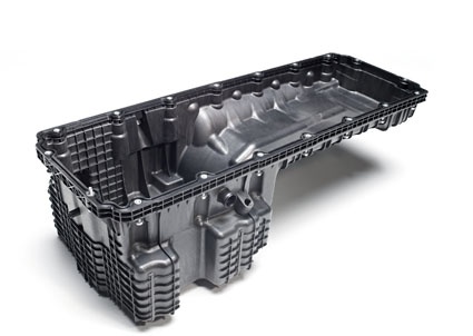 Fig.: This oil pan for the 12.8 liter engine holds 36 liters of oil and is made...