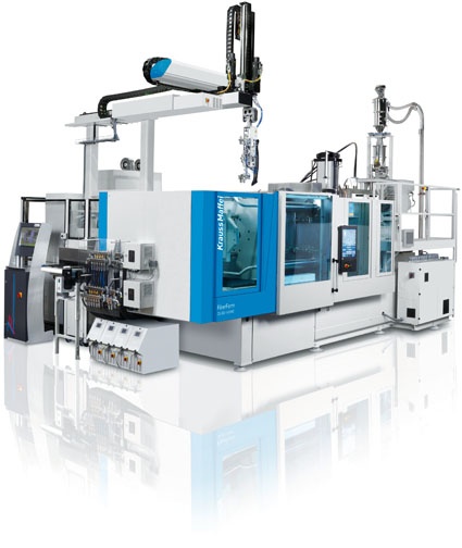 Fig. 2: Production cell for overmolding and back injection molding of organic...