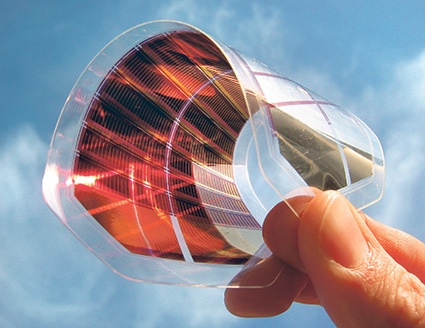 Conductive and transparent plastic film with metallic grid patterns for...