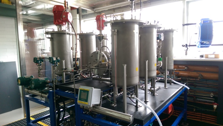 Figure 2: A 2L Cambridge Reactor Design (CRD) flow reactor (centre - silver)...