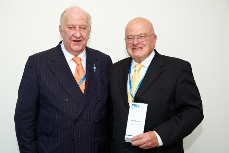 Edgar E. Nordmann, Fecc President (left), presented Marc Fermont with the award...