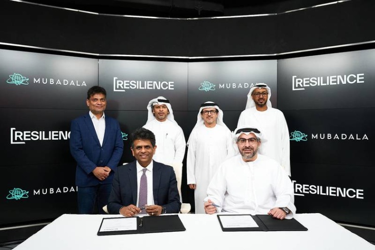 Badr Al Olama executive director, UAE Clusters at Mubadala (R) and Rahul...