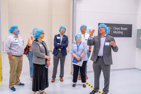 Sanner representatives touring the new facility.