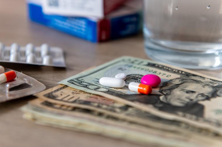 Pill capsules on some money