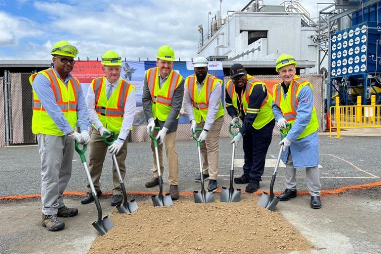 Company representatives at the groundbreaking